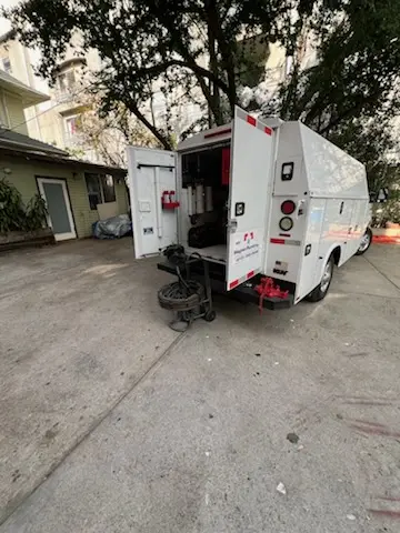 Magnet Plumbing service vehicle on-site for Grease Trap Cleaning in Lakeland
